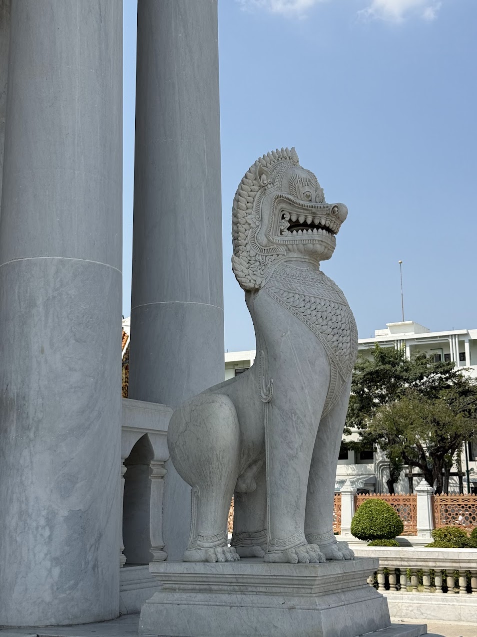 White Singha guardian statue in Thai temple architecture