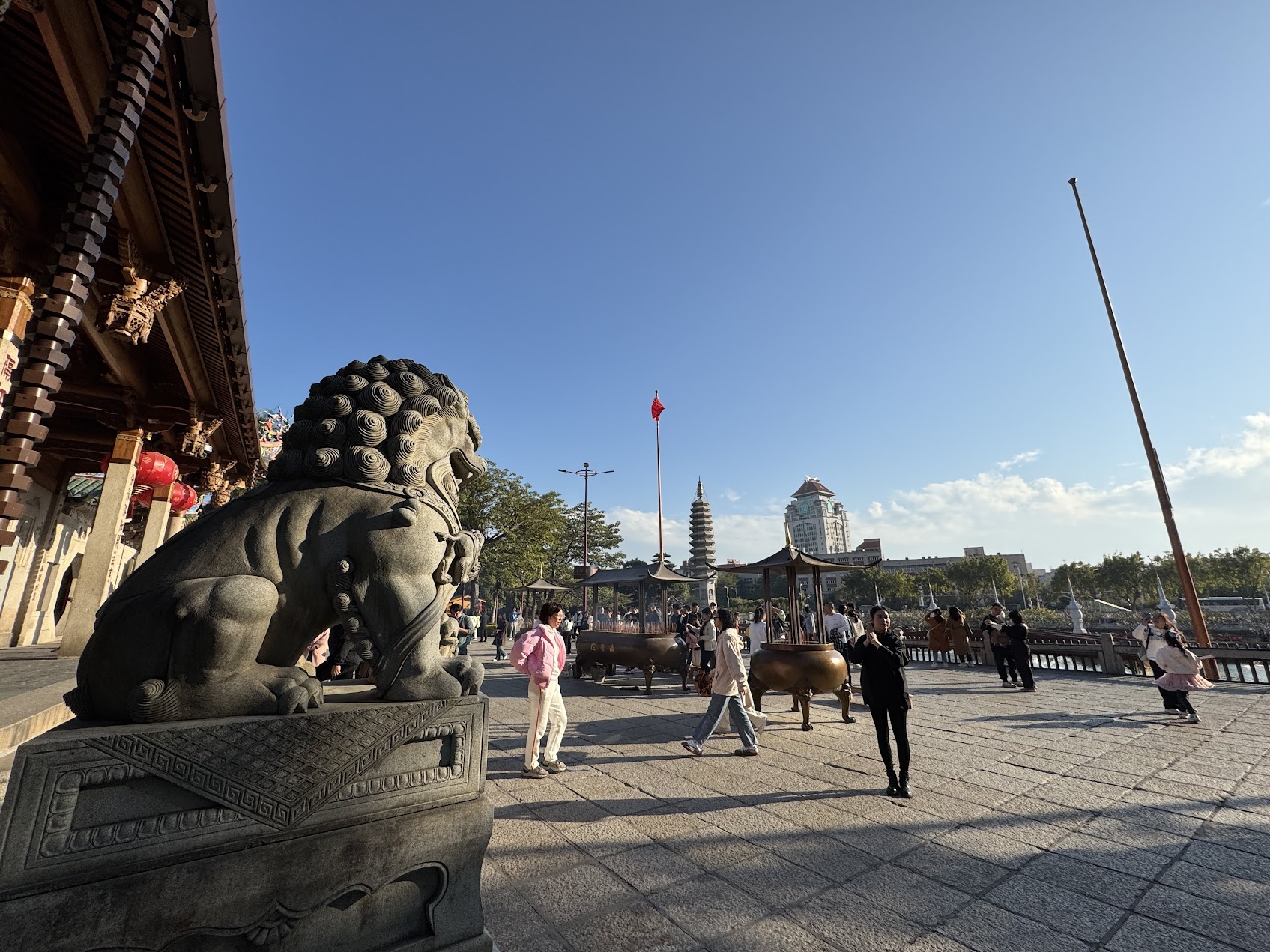 Stone guardian lions at the entrance of Nanputuo Temple in Xiamen, China