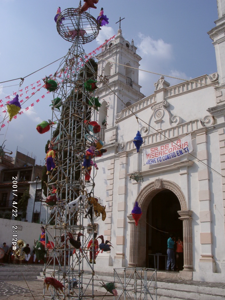 A Catholic festival tower in a church courtyard in Mexico, showing how Holy Week and other liturgical seasons become public, local, and collective religious time in Latin America.